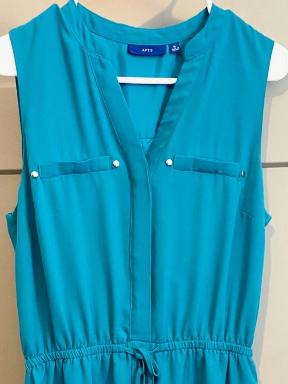 Contemporary style dress with draw string waist & pockets. Lined. Teal blue.